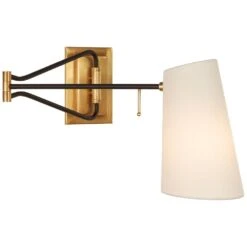 Aerin Keil Swing Arm Wall Light In Antique Brass By VC Signature
